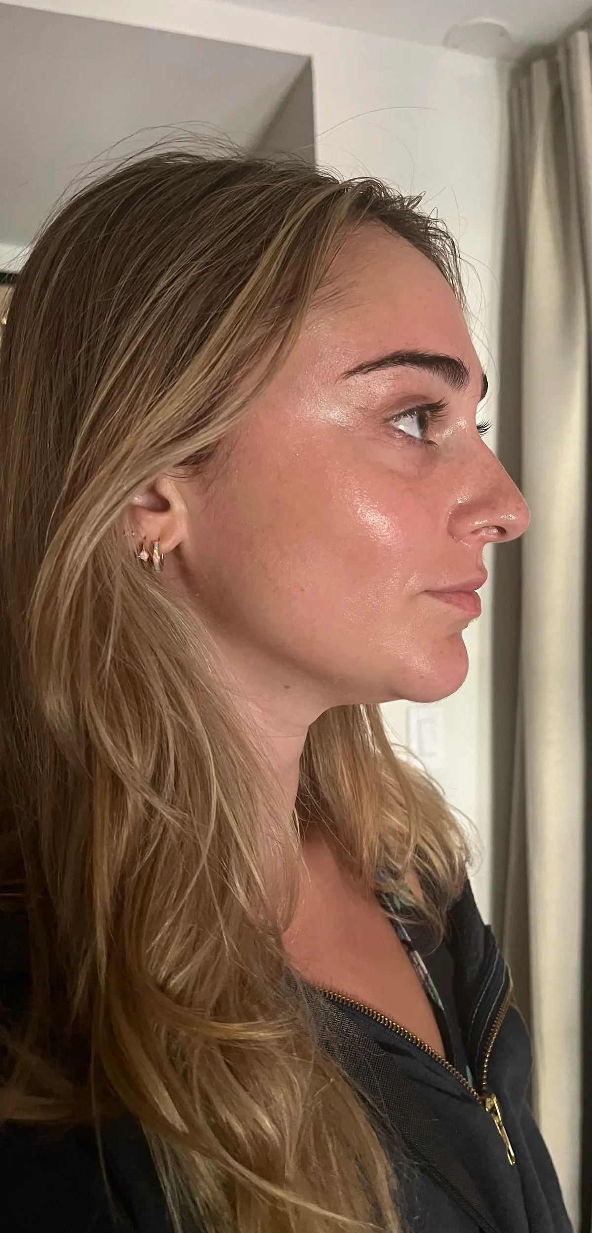 Client with glowing skin after an organic facial