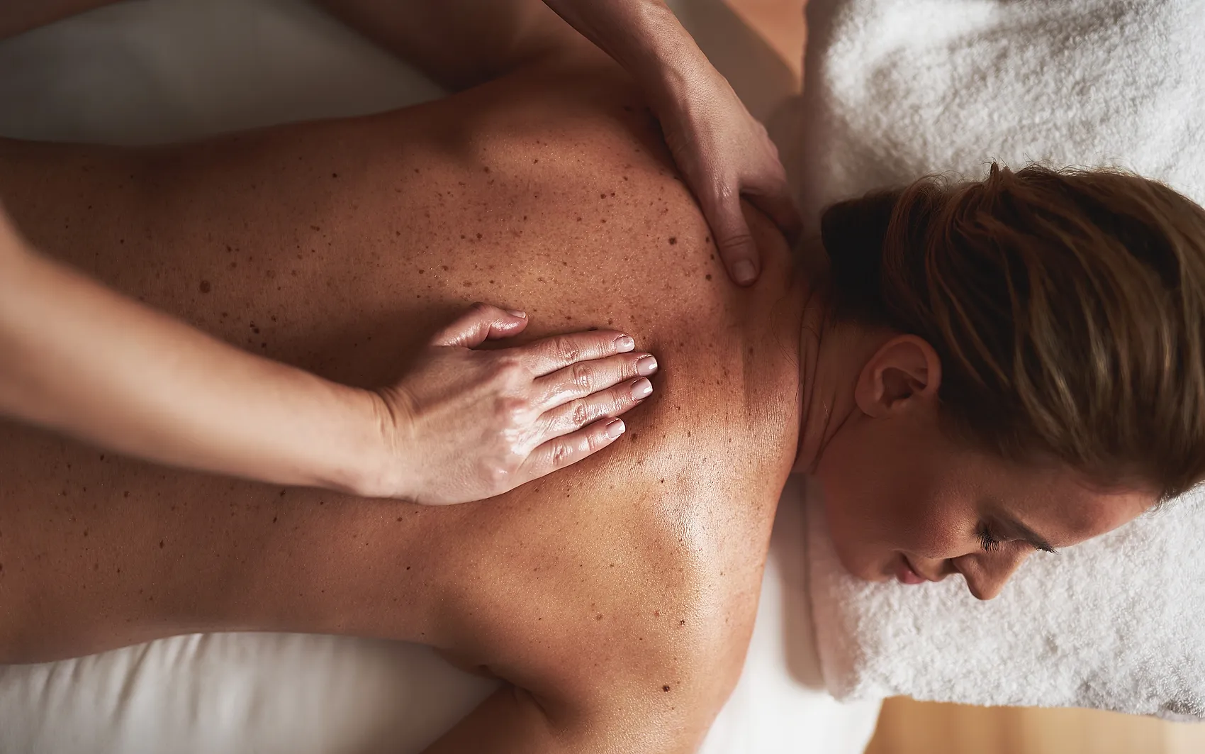 Client enjoying a soothing Swedish oil massage